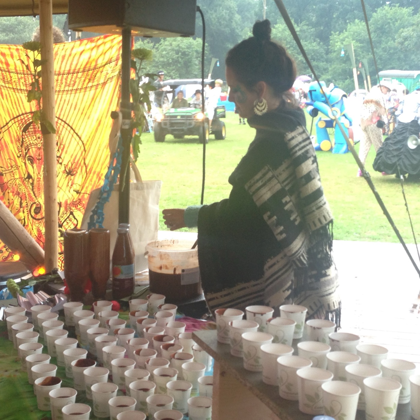 Erin Eber serving cacao at an event