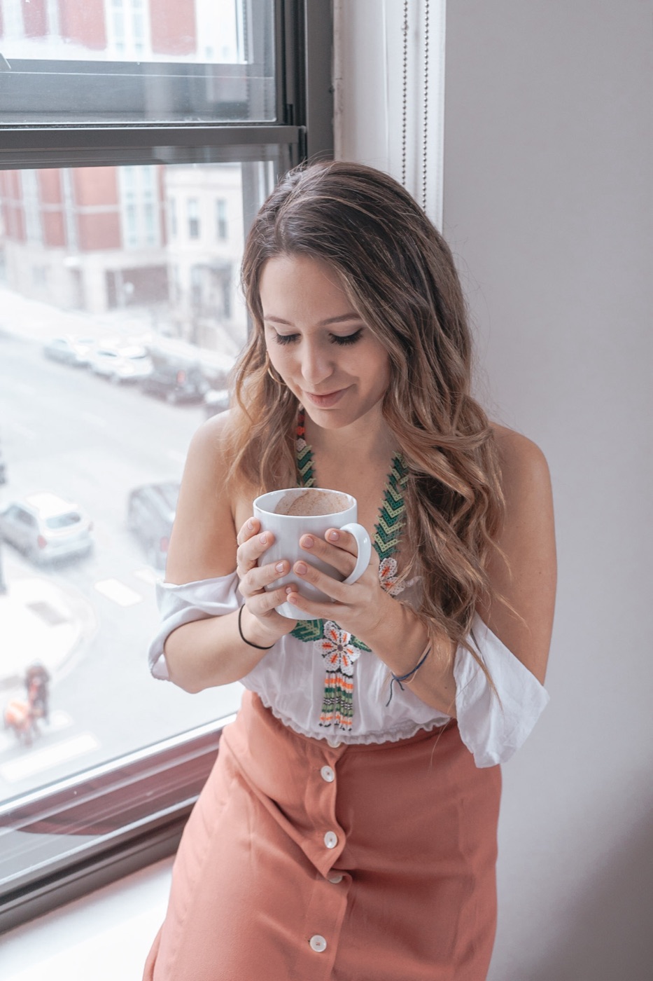 Erin Eber with a cup of cacao