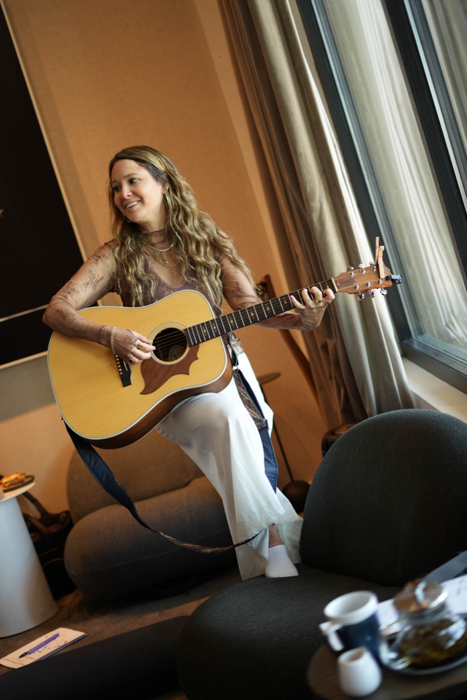 Erin Eber playing music at a gathering